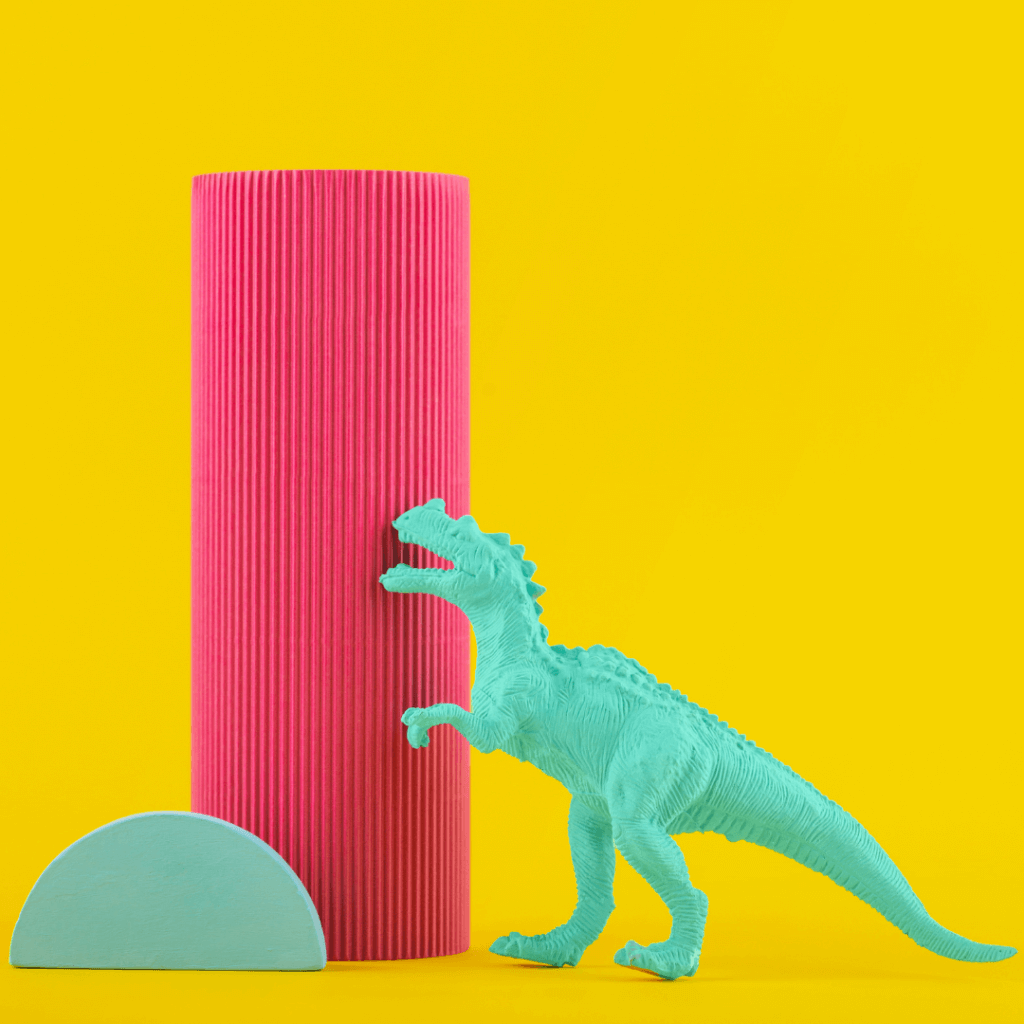 A funny desk accessory, such as a stapler shaped like a dinosaur or a pen holder shaped like a toilet.