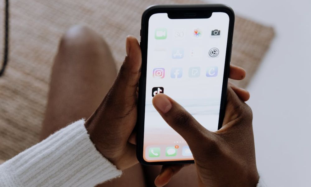 TikTok layoffs AI moderation